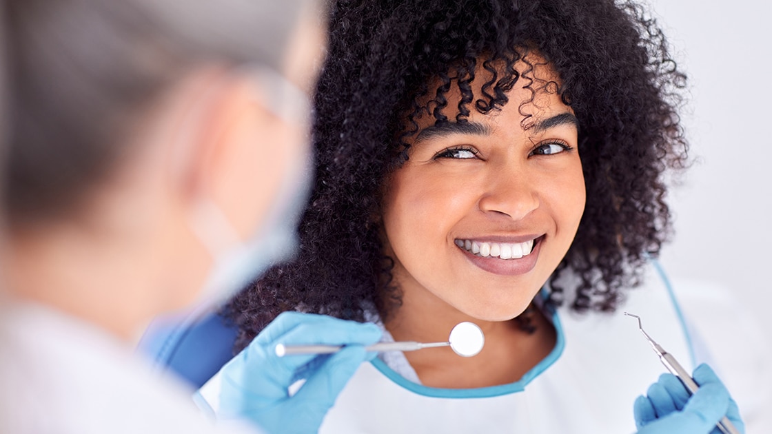 Smiling woman with curly hair